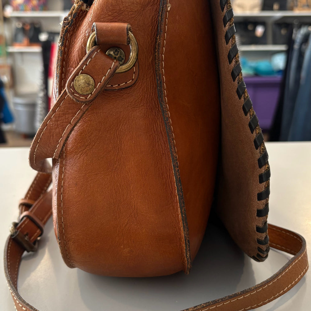 
                      
                        Patricia Nash Metauro Tooled Leather Saddle Bag
                      
                    