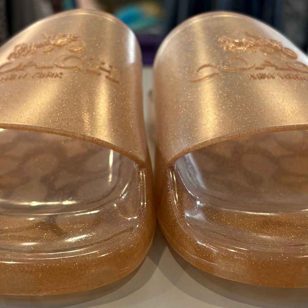 
                      
                        Coach Ulyssa Rubber Dark Gold Slides Size 8b
                      
                    
