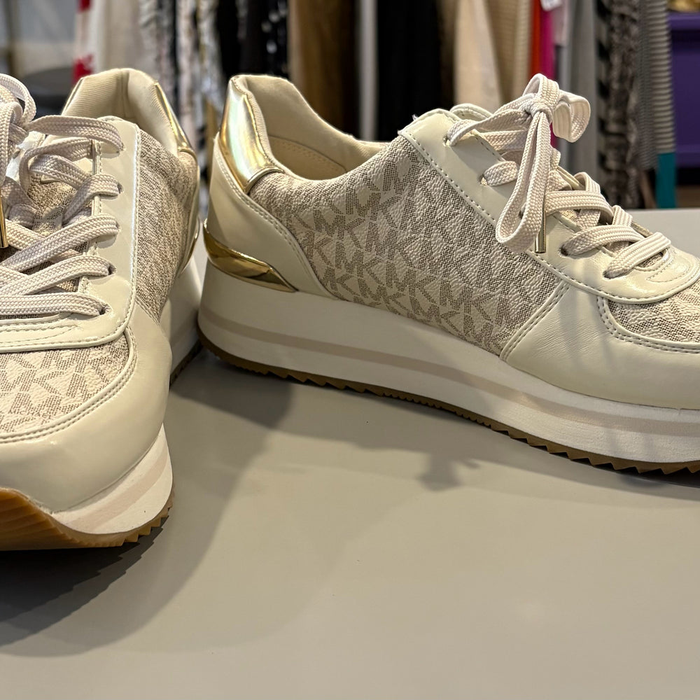 
                      
                        Michael Kors Monique Trainer Sig Semi Lux Sneakers in Cream Size:9
                      
                    