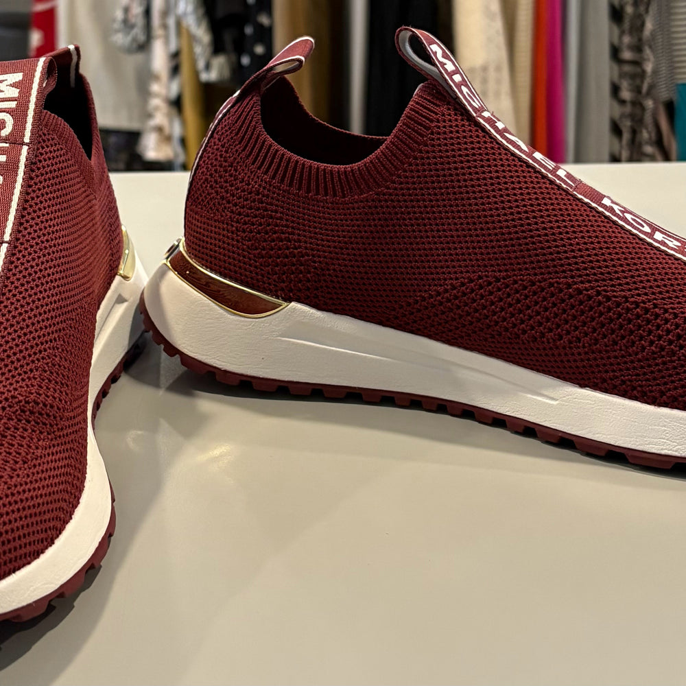 
                      
                        Michael Kors Bodie Logo Tape Mesh Slip On Trainer in Dark Berry Size:9M
                      
                    