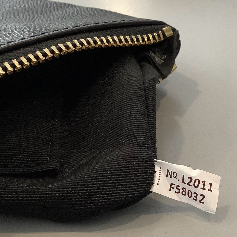 
                      
                        Coach Corner Zip Wristlet
                      
                    