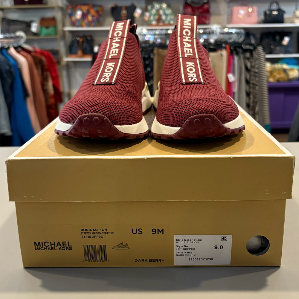 
                      
                        Michael Kors Bodie Logo Tape Mesh Slip On Trainer in Dark Berry Size:9M
                      
                    