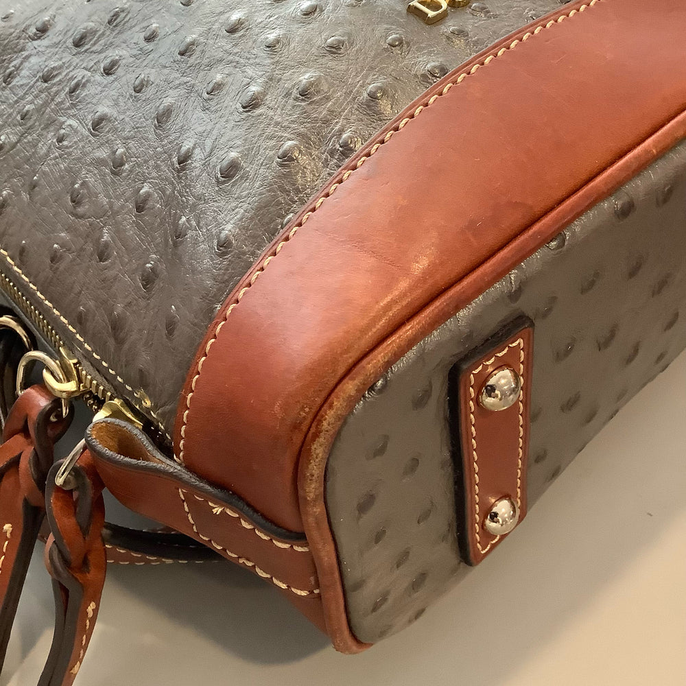 
                      
                        Dooney & Bourke Ostrich Pod Backpack
                      
                    