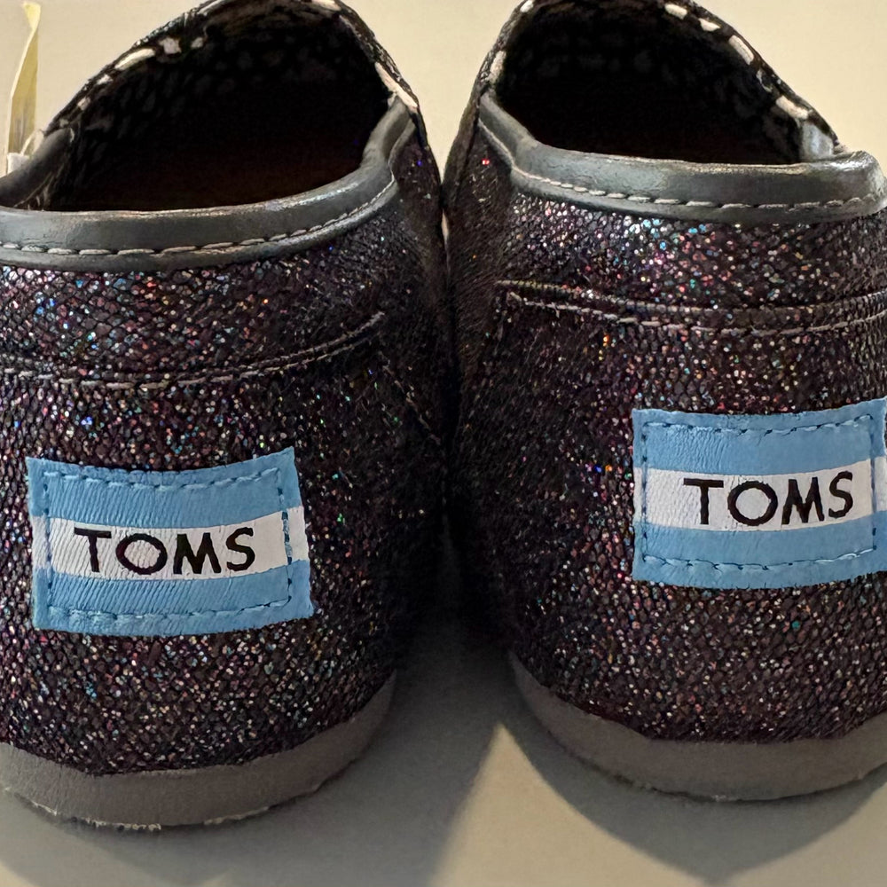
                      
                        8.5W Toms Slip-On Shoes
                      
                    