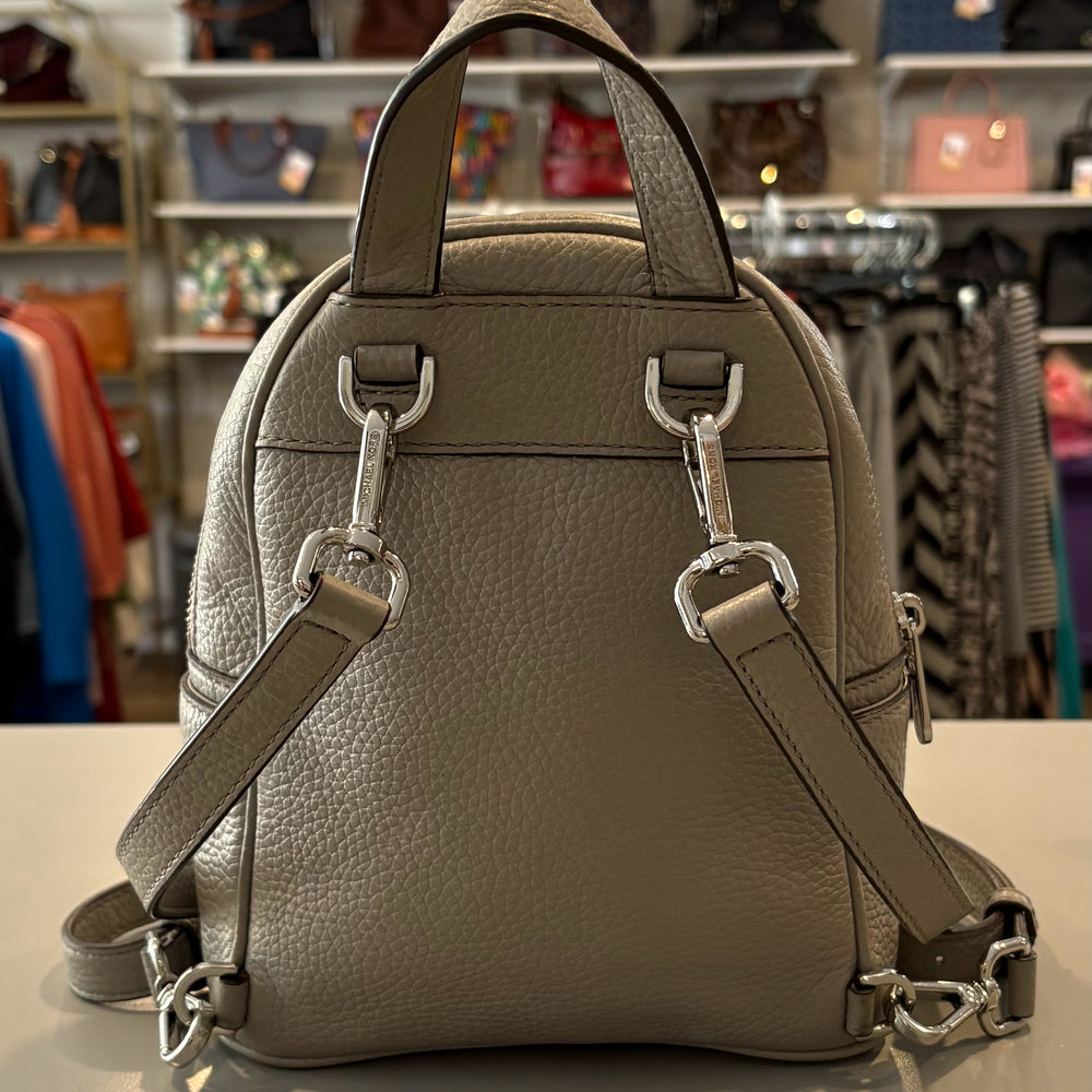 
                      
                        Michael Kors Abbey Pearl Grey Studded Extra Small Backpack
                      
                    