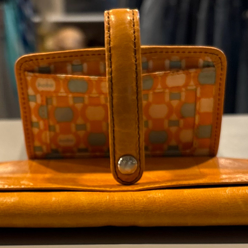 
                      
                        HOBO Orange/Mustard Yellow Leather Wallet
                      
                    