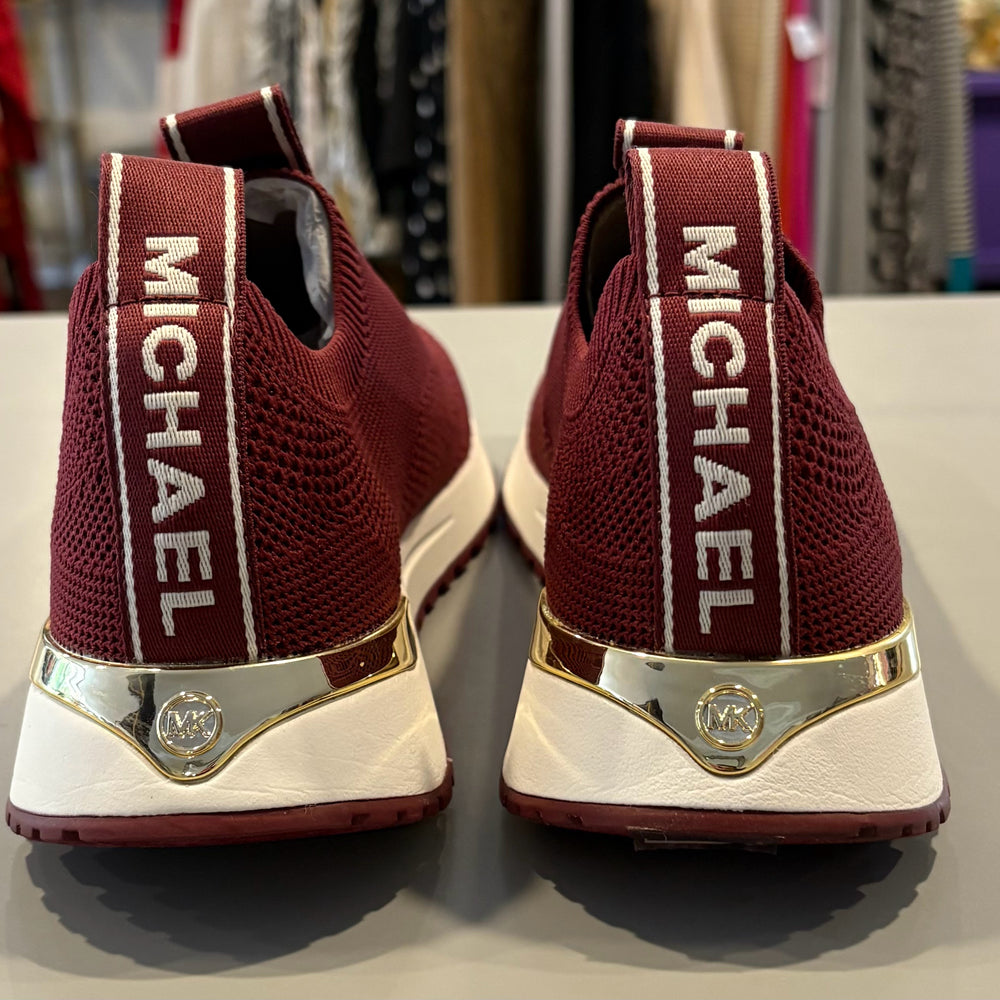 
                      
                        Michael Kors Bodie Logo Tape Mesh Slip On Trainer in Dark Berry Size:9M
                      
                    