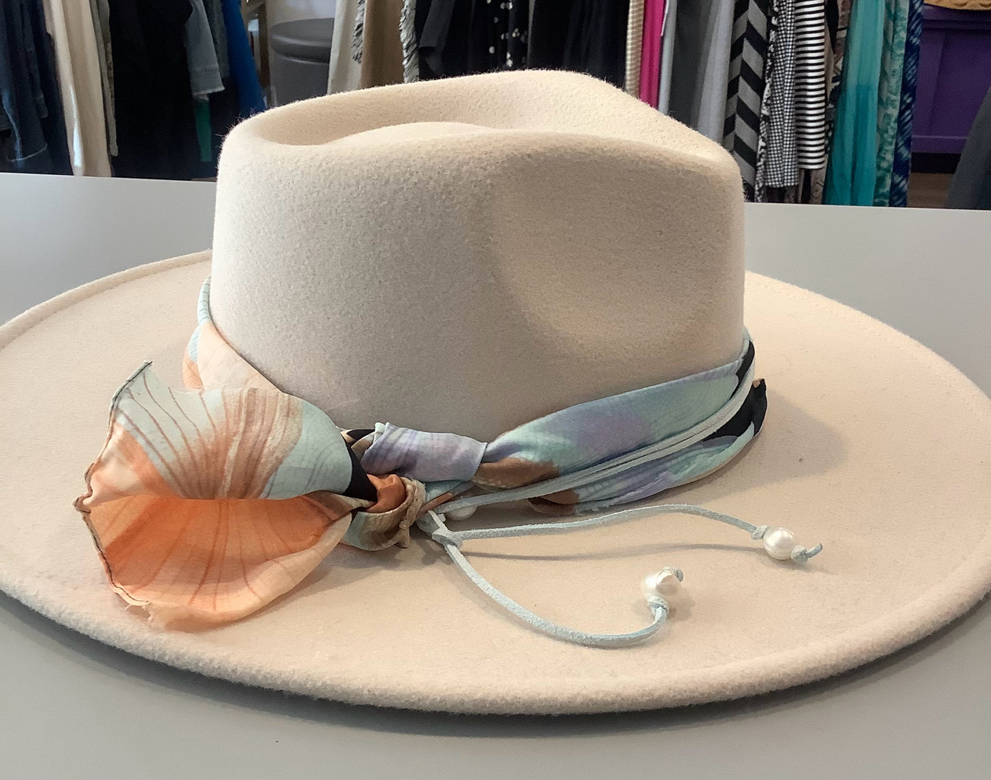 White Felt Hat with multi-colored scarf