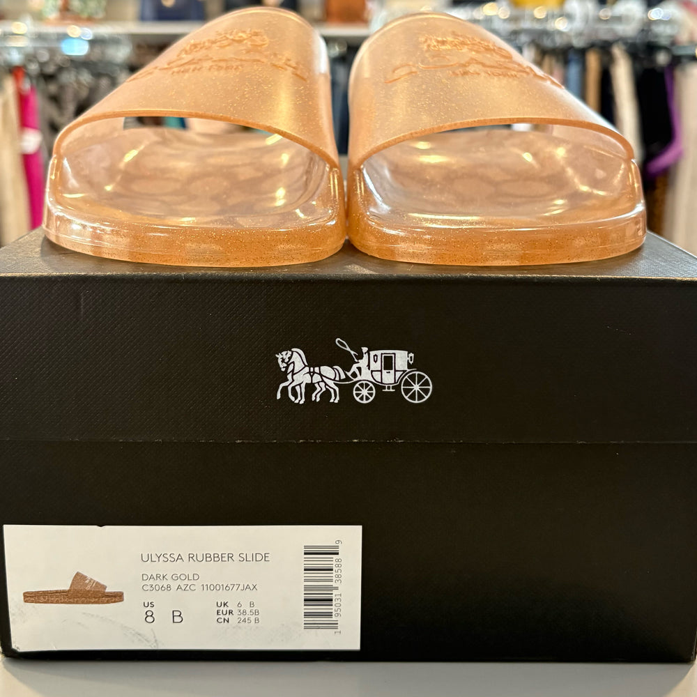 
                      
                        Coach Ulyssa Rubber Dark Gold Slides Size 8b
                      
                    