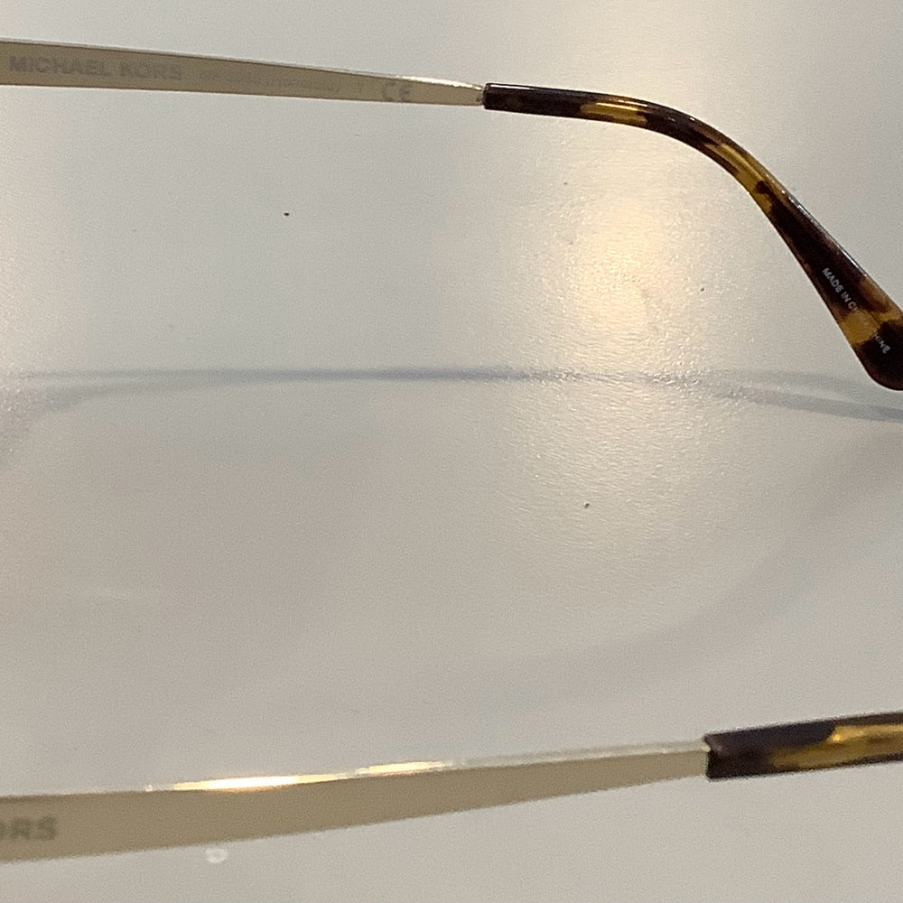 
                      
                        Michael Kors Sunglasses
                      
                    