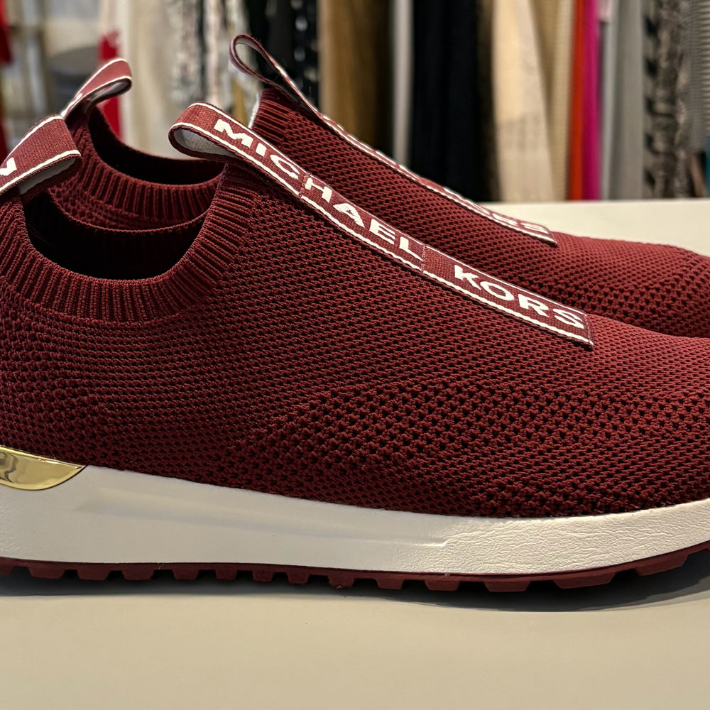 
                      
                        Michael Kors Bodie Logo Tape Mesh Slip On Trainer in Dark Berry Size:9M
                      
                    