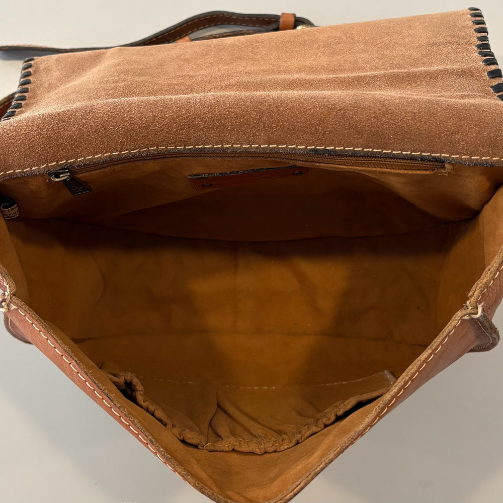 
                      
                        Patricia Nash Metauro Tooled Leather Saddle Bag
                      
                    