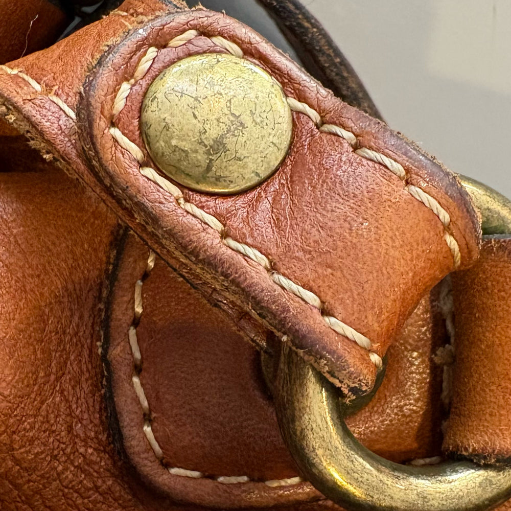 
                      
                        Patricia Nash Metauro Tooled Leather Saddle Bag
                      
                    