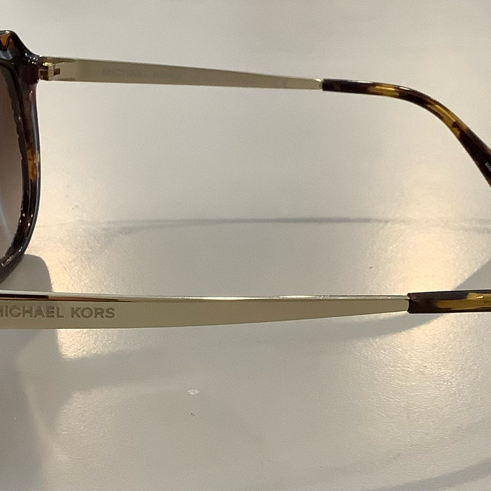
                      
                        Michael Kors Sunglasses
                      
                    