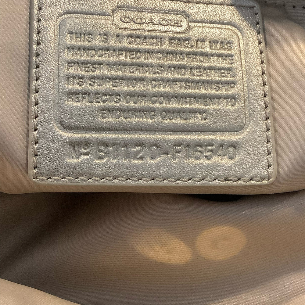 
                      
                        Coach Handbag
                      
                    