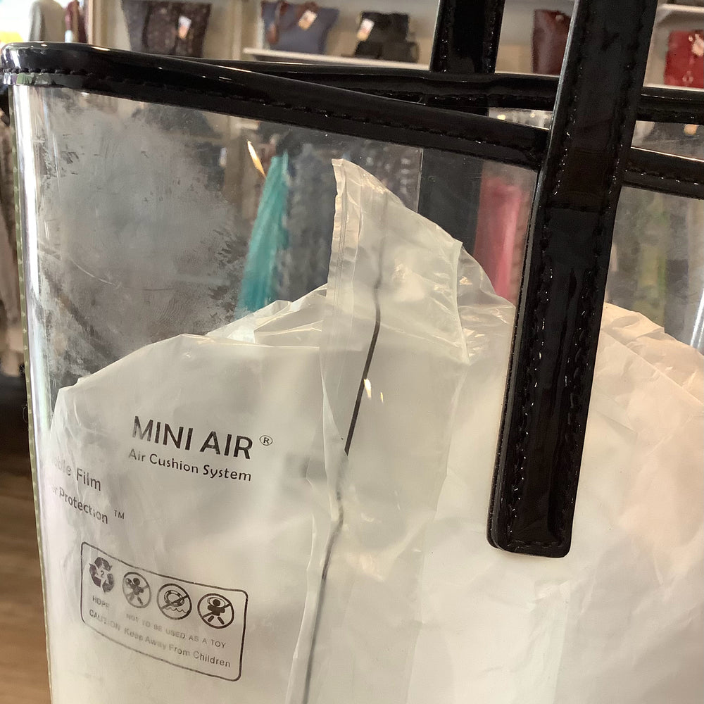 
                      
                        Michael Kors CLear and Black Large Tote Bag
                      
                    