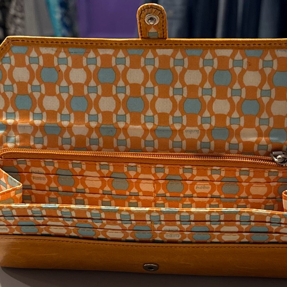 
                      
                        HOBO Orange/Mustard Yellow Leather Wallet
                      
                    