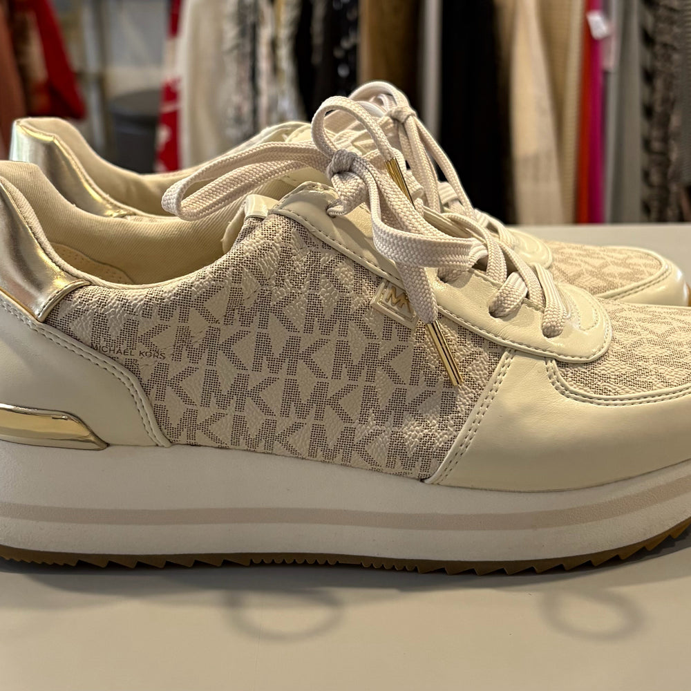 
                      
                        Michael Kors Monique Trainer Sig Semi Lux Sneakers in Cream Size:9
                      
                    