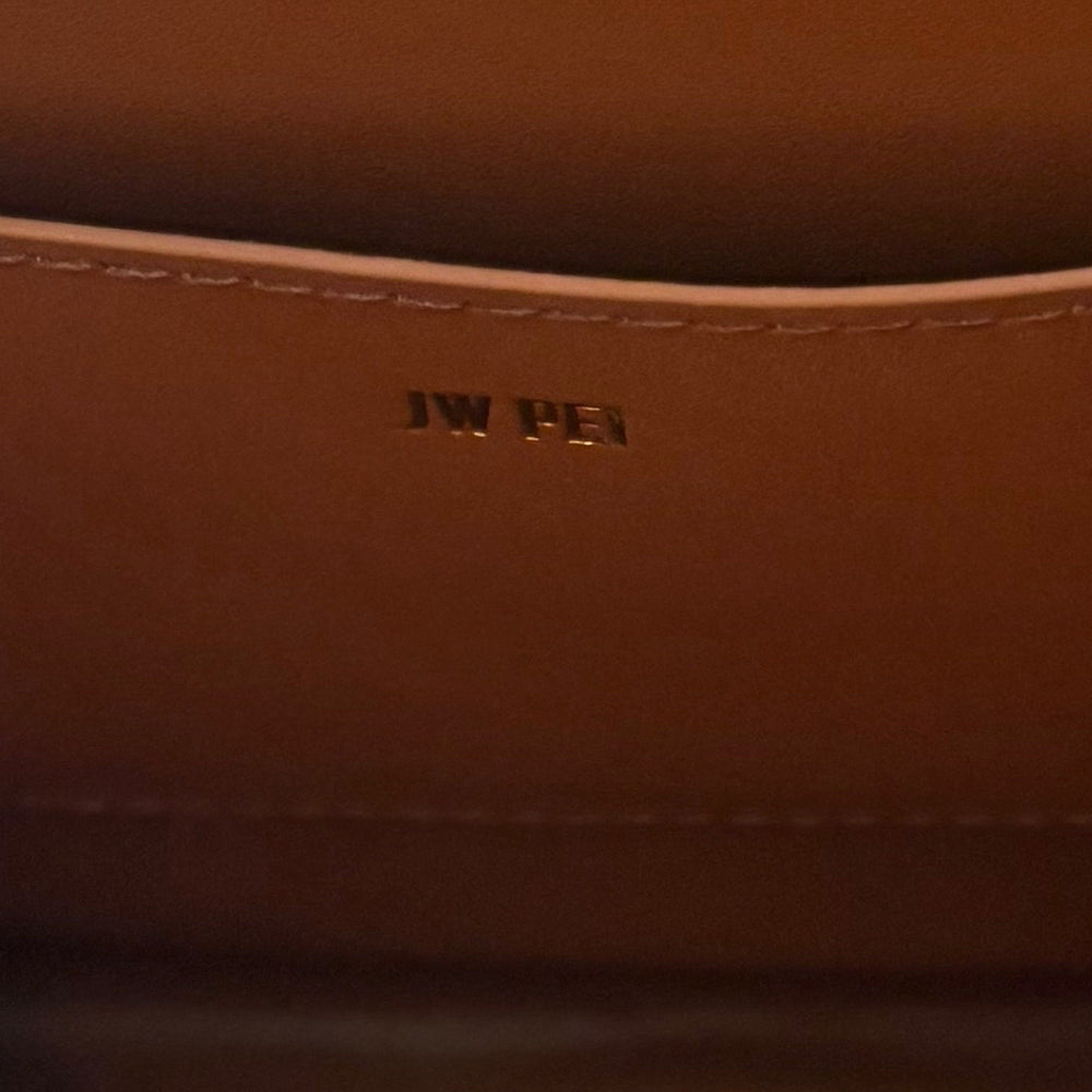 
                      
                        JW PEI Joy Brown Canvas Shoulder Bag
                      
                    