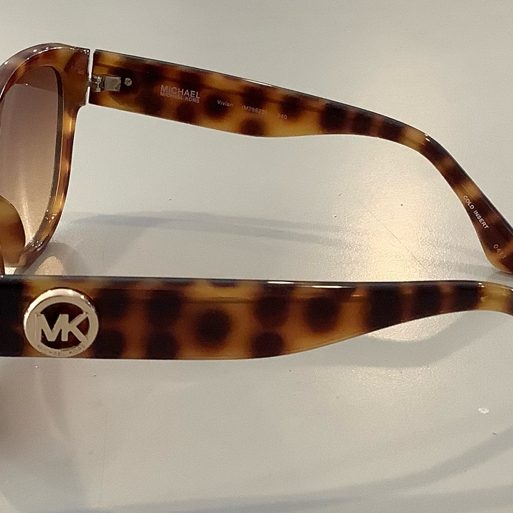 
                      
                        Michael Kors Sunglasses
                      
                    
