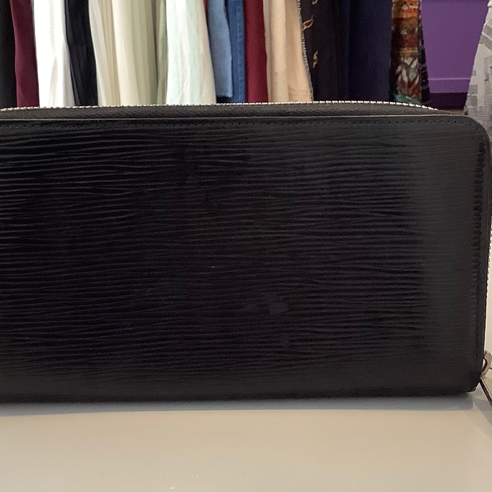 
                      
                        Louis Vuitton Epi Zippy Wallet
                      
                    