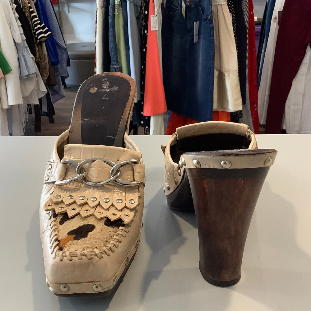 
                      
                        Leather Mules
                      
                    