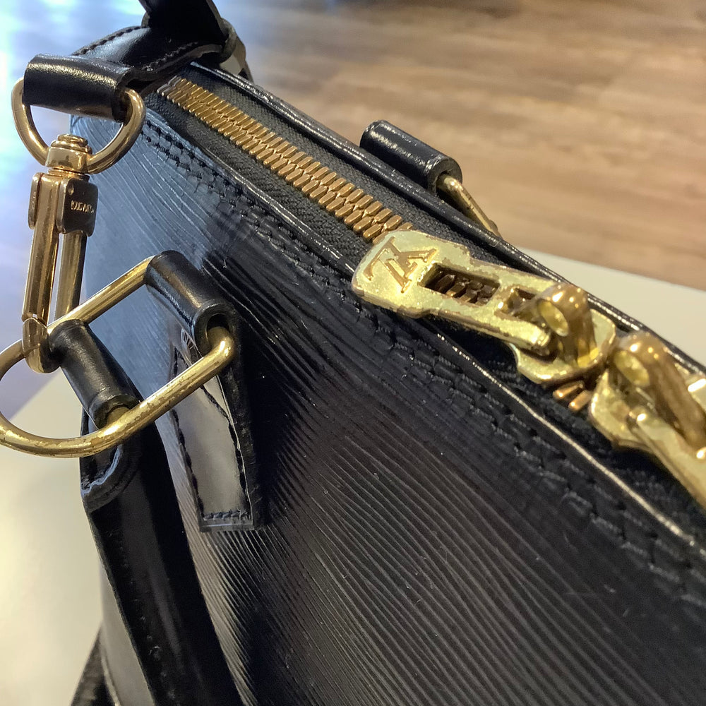 
                      
                        Louis Vuitton Epi Alma PM
                      
                    