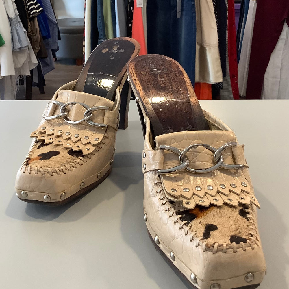 
                      
                        Leather Mules
                      
                    